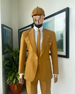 A Mustard Yellow Linen Jacket, Slim Cut Tie, Gurkha Pant Trousers, And Hat