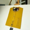 A Mustard Yellow with an interlocking lane design square-shaped buttons African kaftan