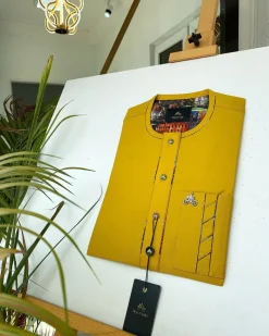 A Mustard Yellow with Swarovski button detailing African Kaftan and sokoto
