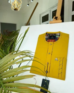 A Mustard Yellow with Swarovski button detailing African Kaftan and sokoto