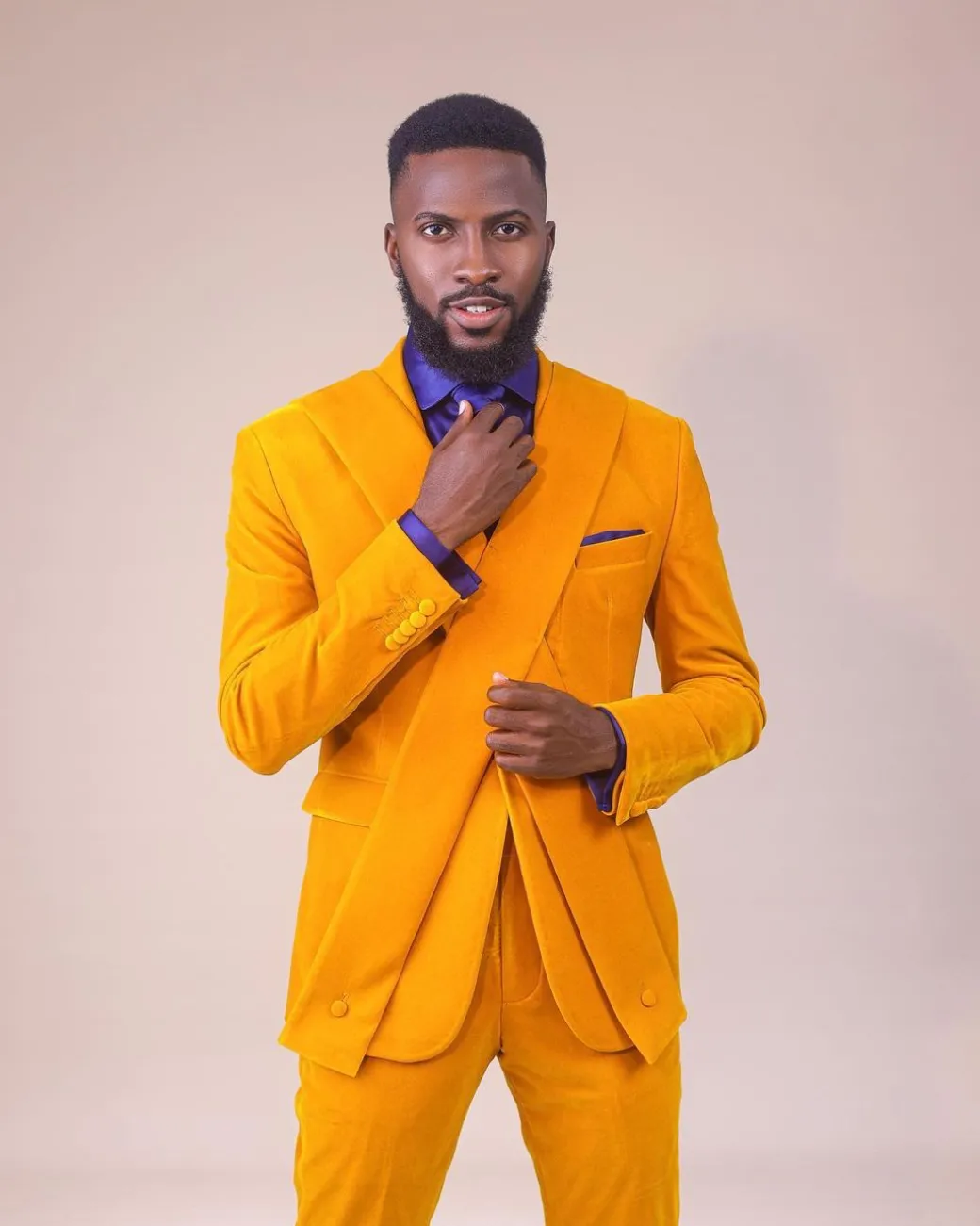A Mustard yellow “X” one button Notch lapel suit