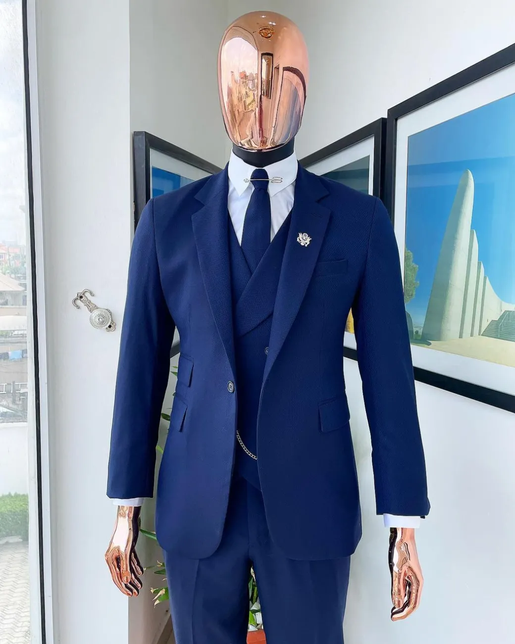 A navy blue – layered square patterned – Jorgecarli super 140’s- “Board Room” notch lapel suit