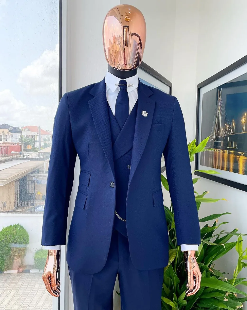 A navy blue – layered square patterned – Jorgecarli super 140’s- “Board Room” notch lapel suit