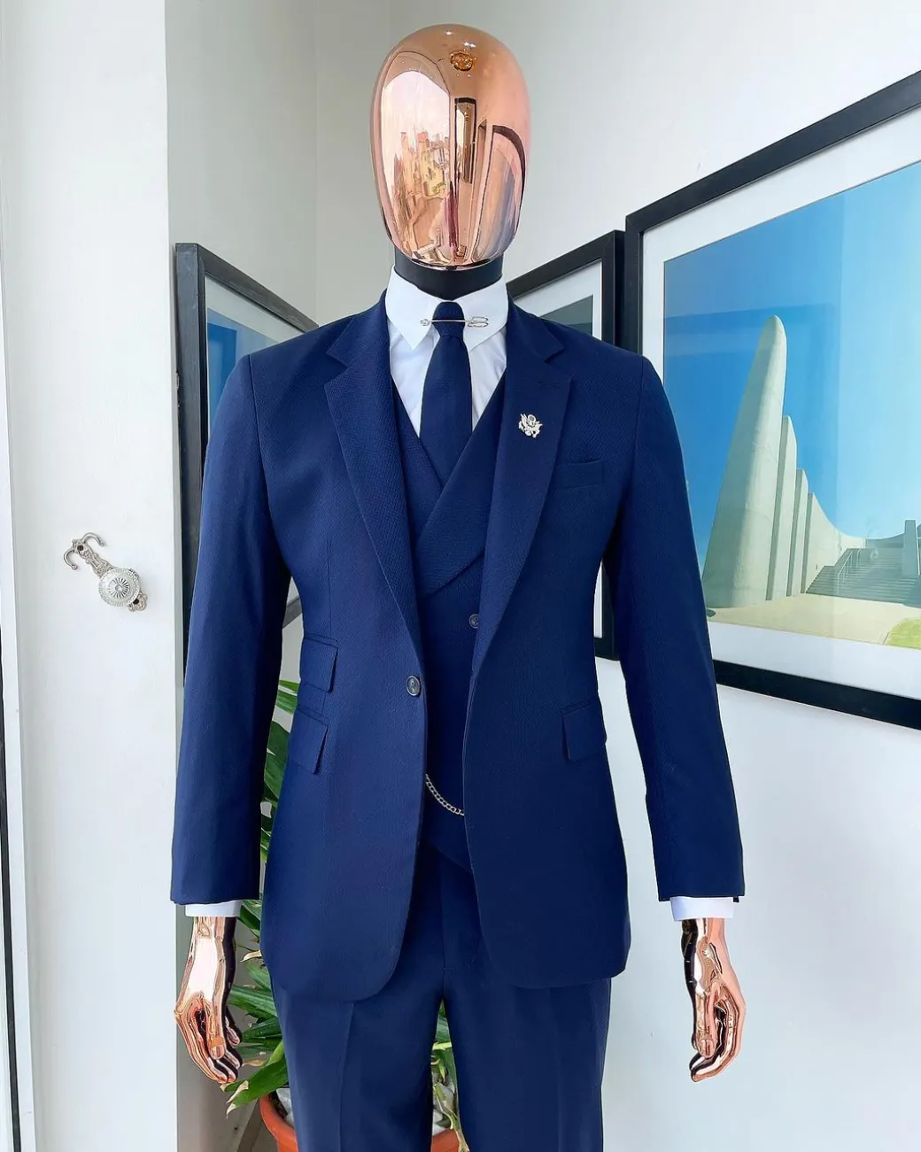A navy blue – layered square patterned – Jorgecarli super 140’s- “Board Room” notch lapel suit