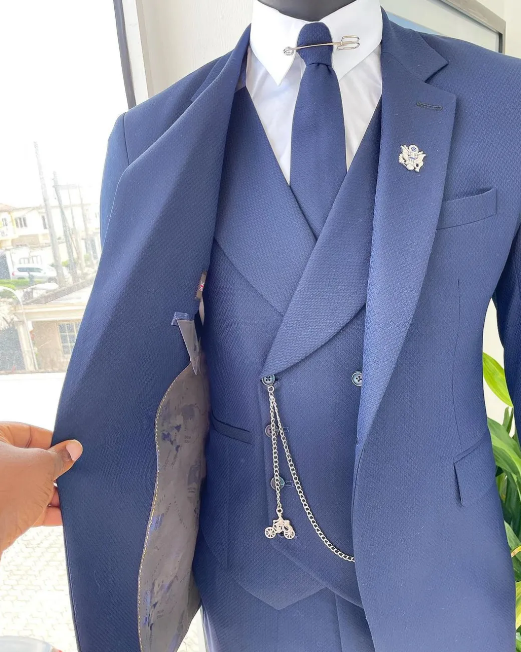 A navy blue – layered square patterned – Jorgecarli super 140’s- “Board Room” notch lapel suit