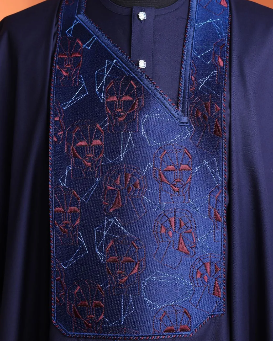 A Navy Blue, AI connected iron-man maze embrodery details agbada