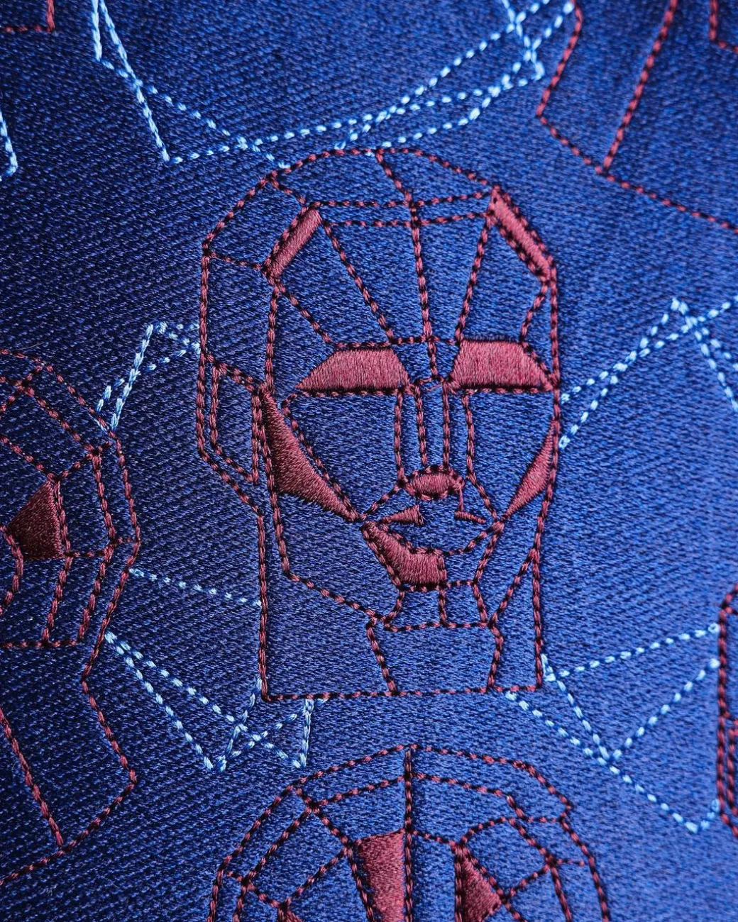 A Navy Blue, AI connected iron-man maze embrodery details agbada