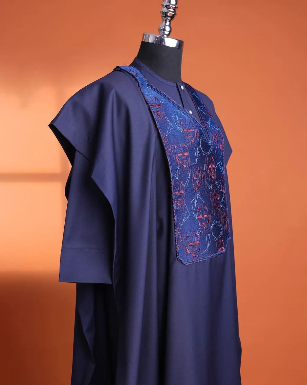 A Navy Blue, AI connected iron-man maze embrodery details agbada