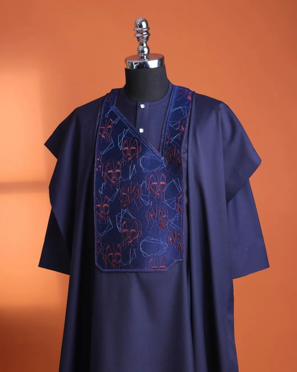A Navy Blue, AI connected iron-man maze embrodery details agbada