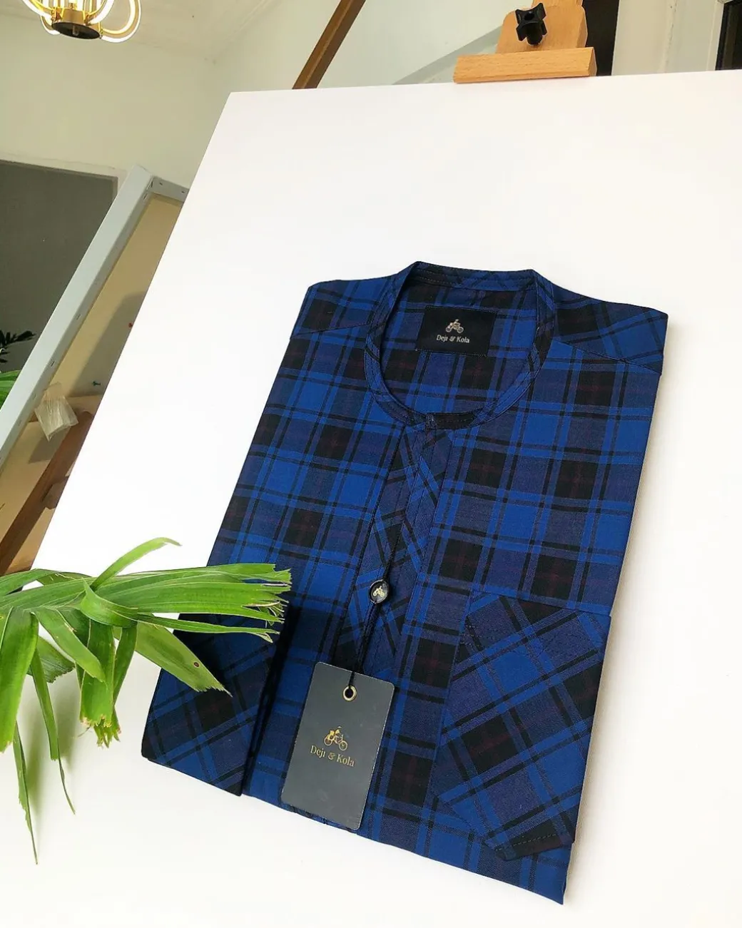 A Navy Blue and Black Check Front flap detailing Kaftan