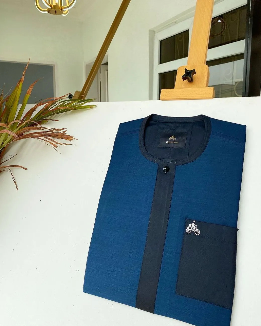 A Navy blue and blue flap African kaftan with matching patch pocket and Sokoto