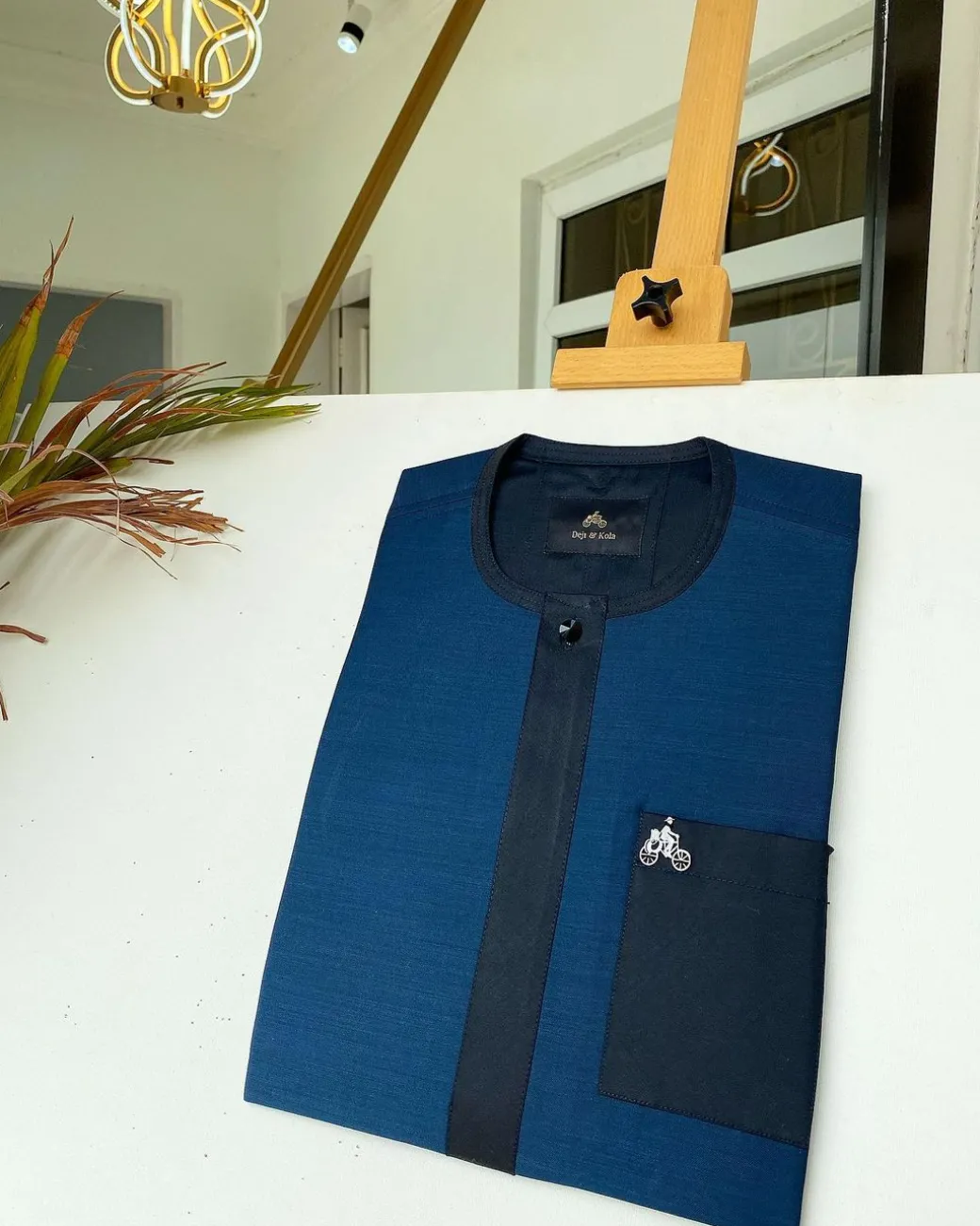 A Navy blue and blue flap African kaftan with matching patch pocket and Sokoto