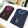 A Navy Blue and Burgundy Front Flap detailing Kaftan