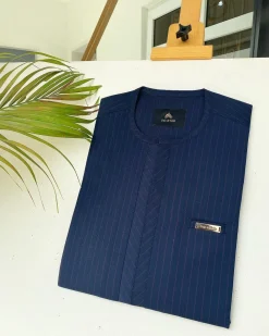 A Navy blue and red pinstripe African kaftan with an adjacent lane design and Sokoto