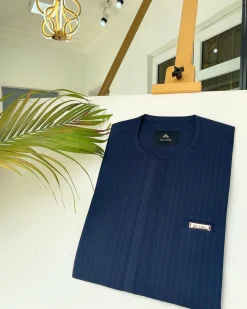 A Navy blue and red pinstripe African kaftan with an adjacent lane design and Sokoto