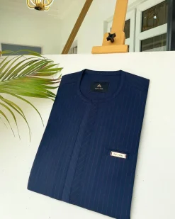 A Navy blue and red pinstripe African kaftan with an adjacent lane design and Sokoto