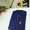 A Navy blue and red windowpane check traditional African kaftan and Sokoto