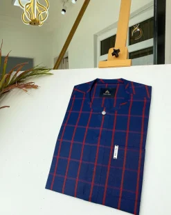 A Navy blue and red windowpane check traditional African kaftan and Sokoto
