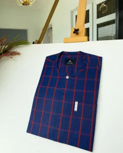 A Navy blue and red windowpane check traditional African kaftan and Sokoto