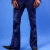 A Navy Blue “Anikulapo” High Waist, Trumpet Cut With Arewa Embroidery Details Pant With Side Metal Adjuster.