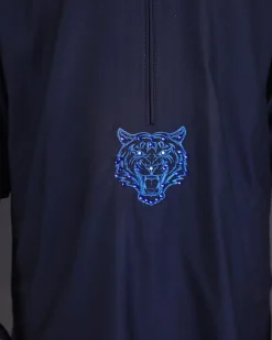 A Navy blue arrow and tiger head embroidery detail with matching Swarovski stone kaftan and Sokoto