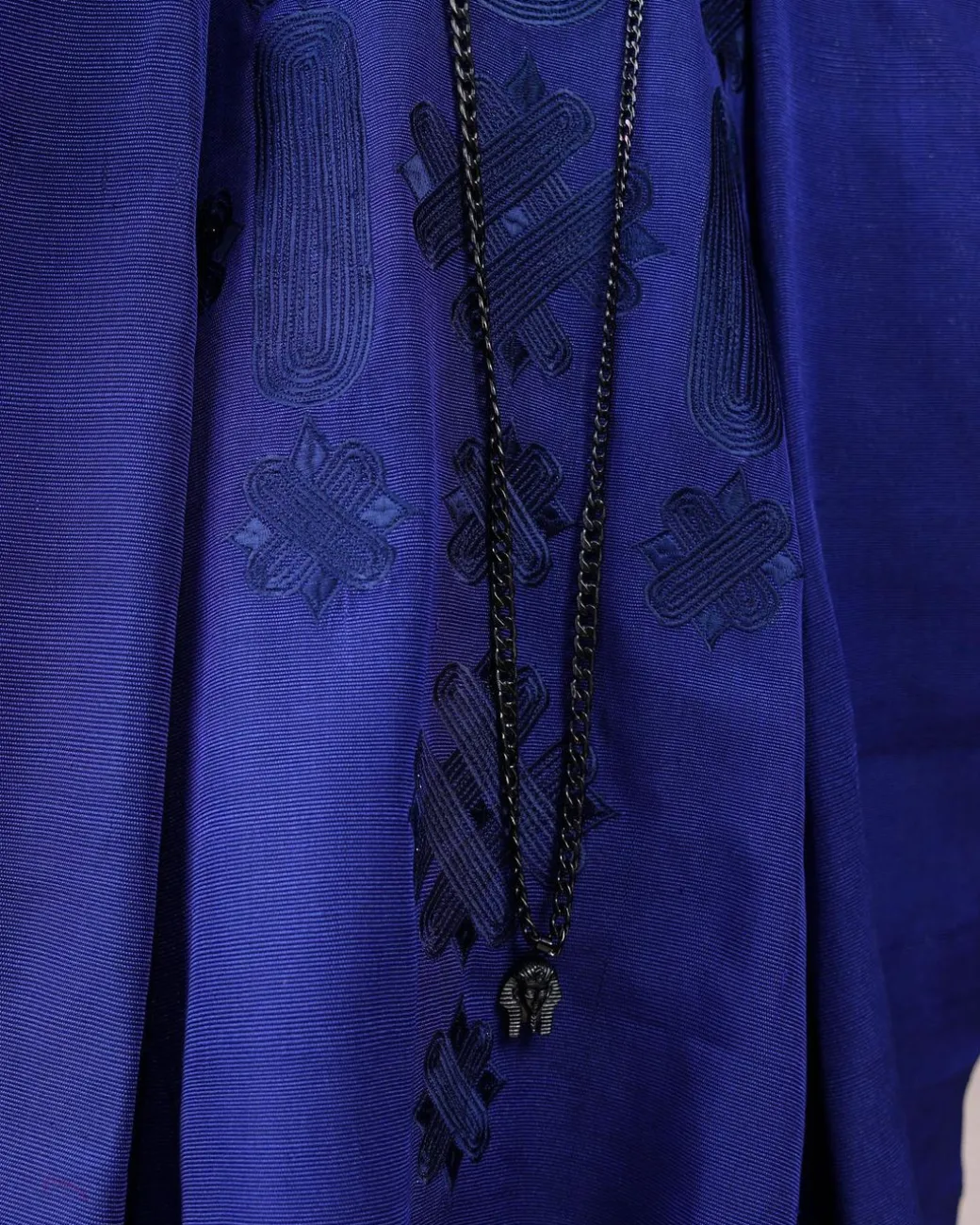 A Navy blue aso-oke, spiral embroidery detailing agbada