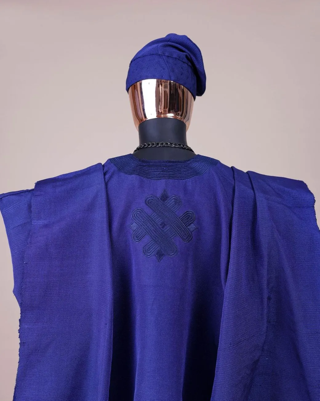 A Navy blue aso-oke, spiral embroidery detailing agbada