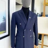 A Navy Blue Chalk Stripe Double Breasted Peak Lapel Suit