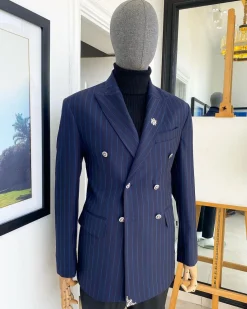 A Navy Blue Chalk Stripe Double Breasted Peak Lapel Suit