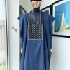 A Navy blue, connected square embroidery design details agbada