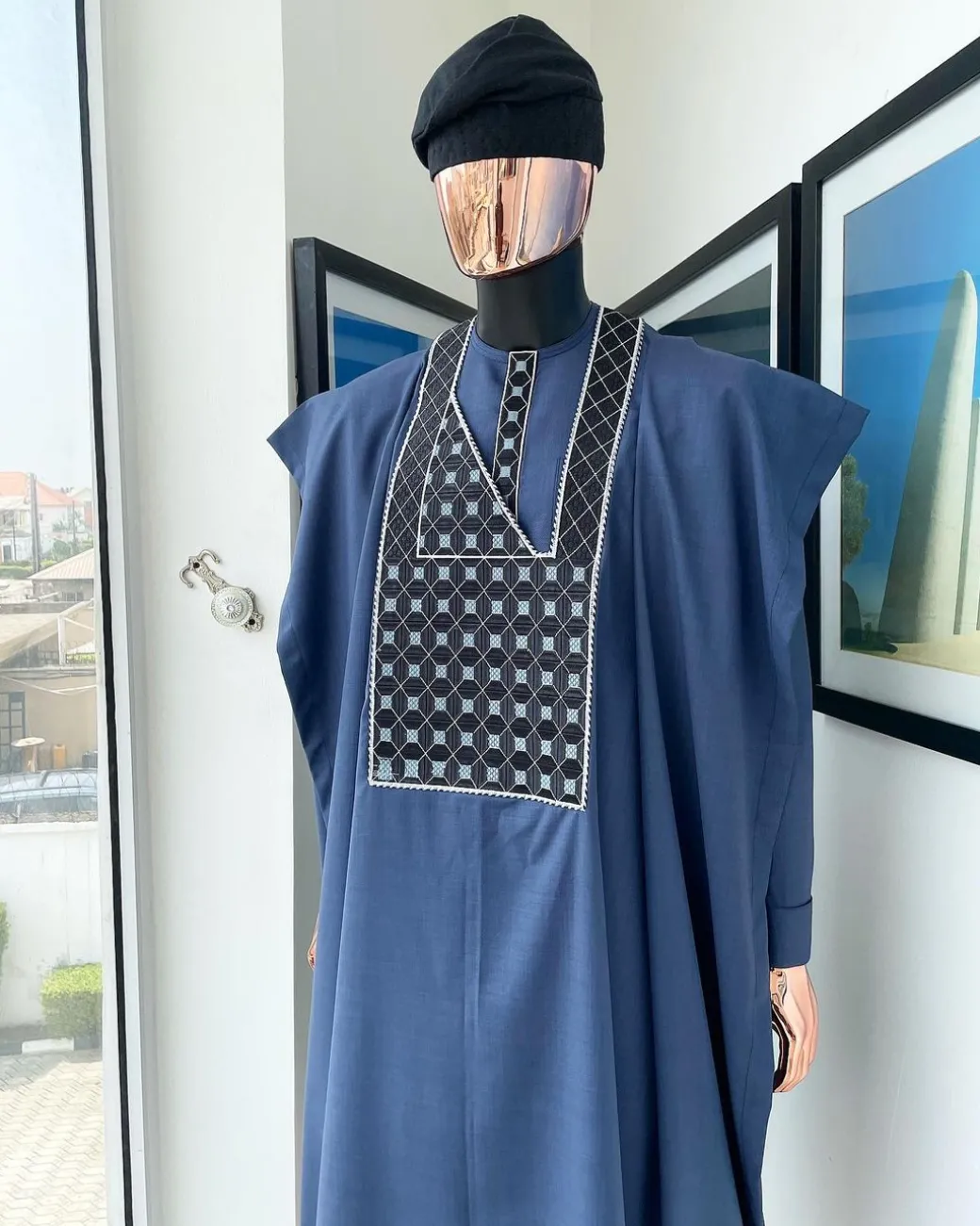 A Navy blue, connected square embroidery design details agbada