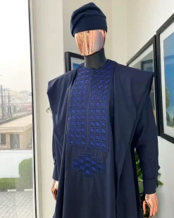 A Navy blue, connected square embroidery design with matching Skye blue Swarovski stone details agbada
