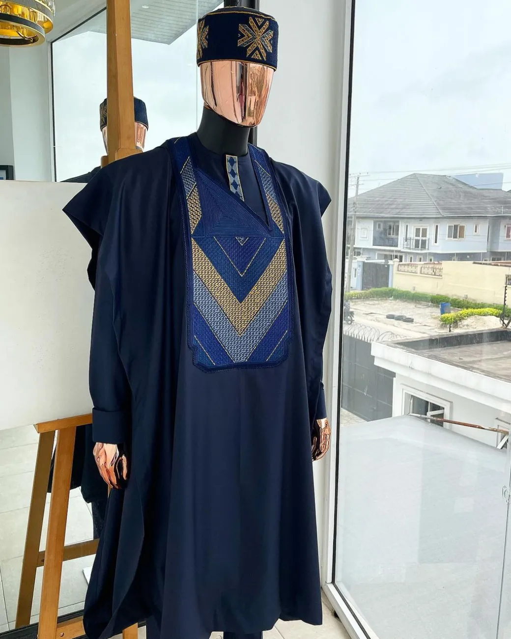 A Navy blue, Connected triangle -layered 3D embroidery design details agbada