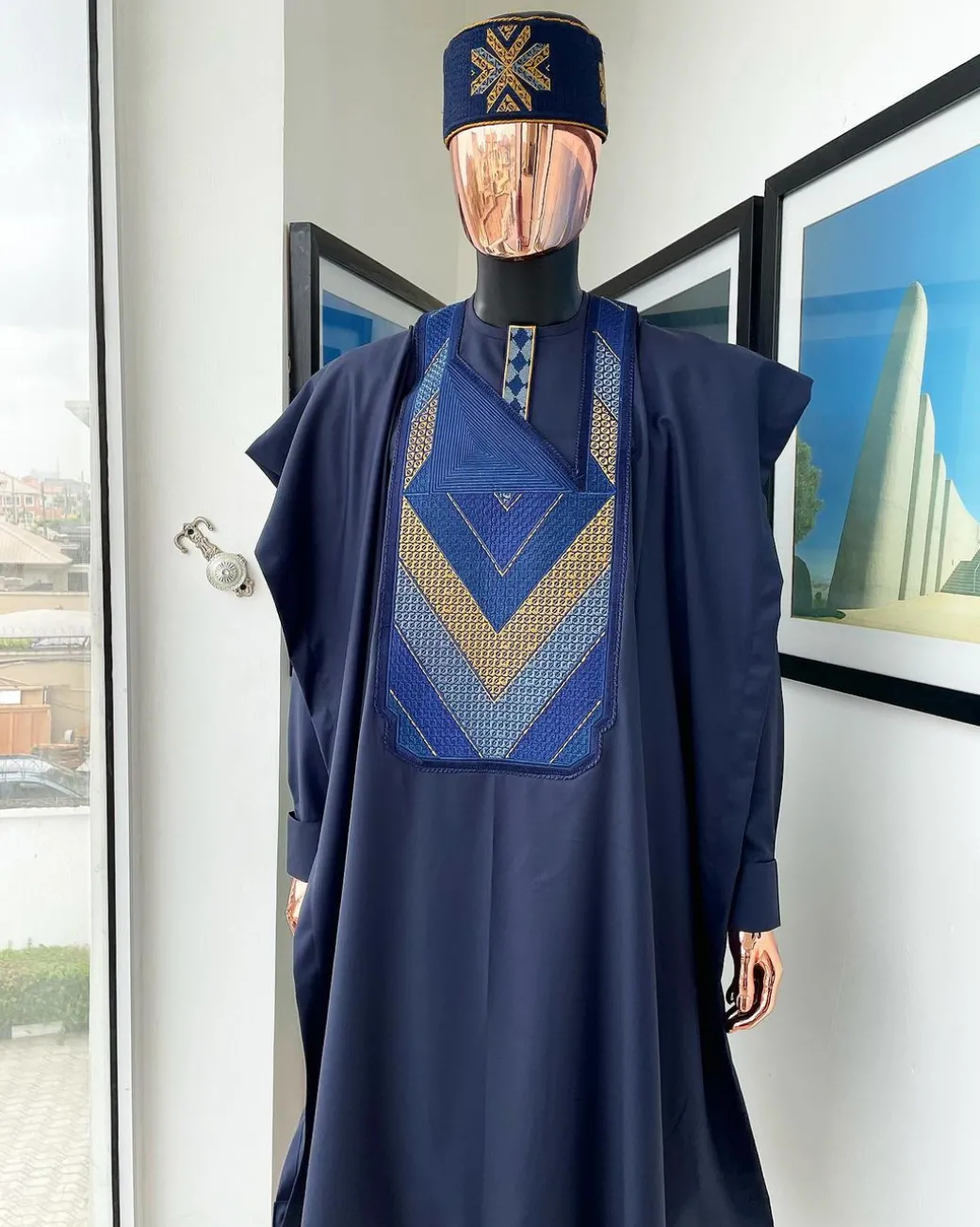 A Navy blue, Connected triangle -layered 3D embroidery design details agbada