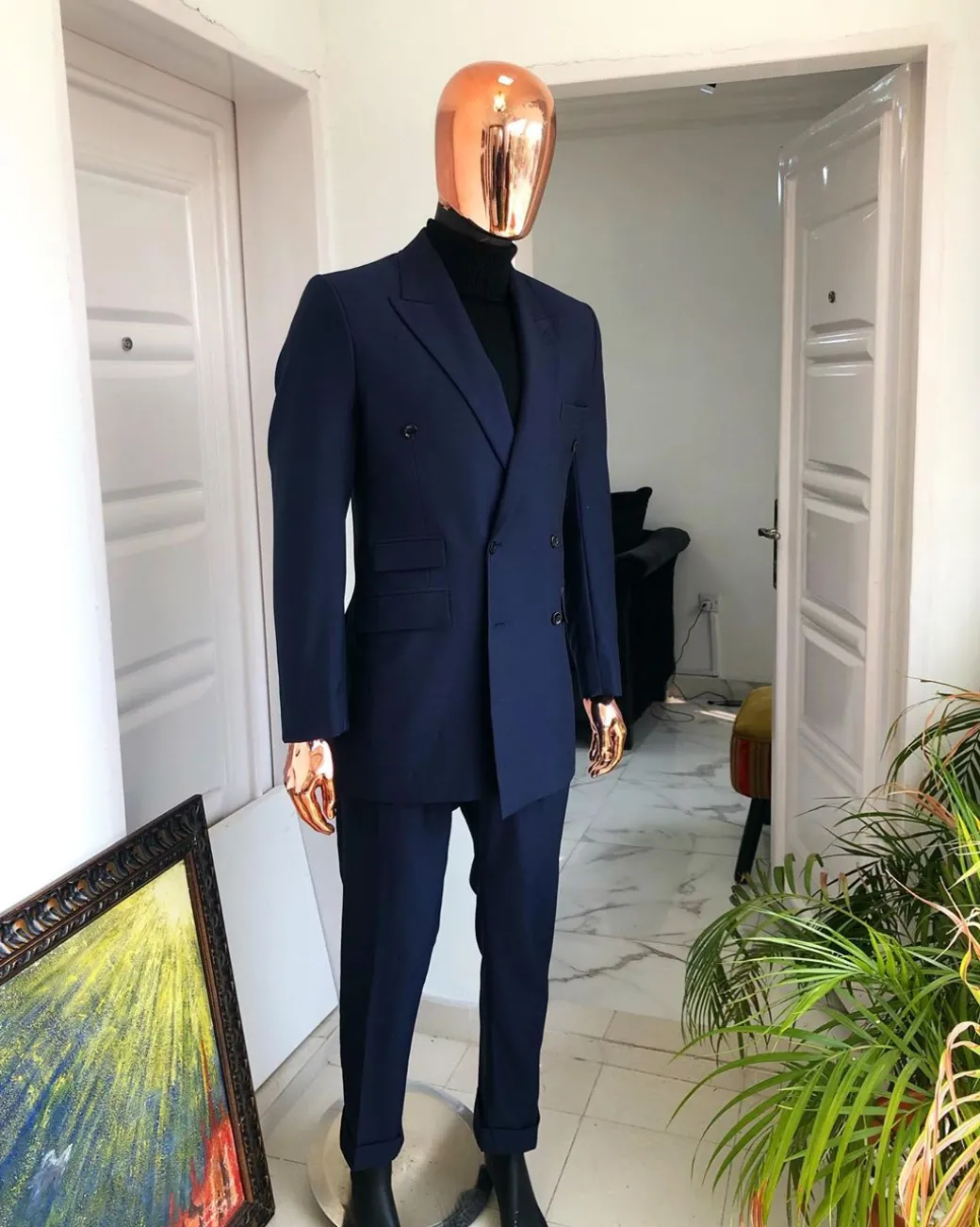 A Navy Blue Double Breasted corporate Peak lapel suit