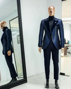 A Navy blue, floral pattern jacquard, peak lapel tuxedo suit