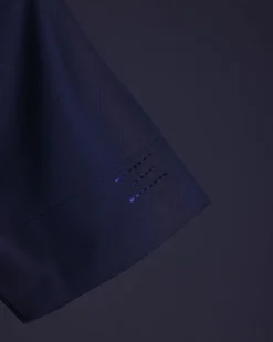 A Navy blue front flap, patch pocket with spiral embroidery detailing African senator Kaftan