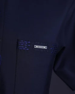 A Navy blue front flap, patch pocket with spiral embroidery detailing African senator Kaftan