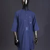 A Navy blue front flap with a clear view Swarovski button, connected sailor and basket embroidery detailing kaftan and Sokoto