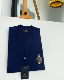 A Navy blue front flap with an Indian hand embroidery patch details African traditional senator kaftan native