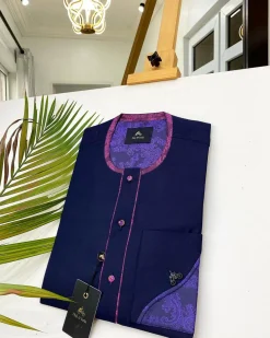 A Navy blue front flap with a clear view of Swarovski crystal buttons, short-sleeve African kaftan