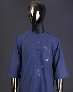 A Navy blue front flap with a clear view Swarovski button, connected sailor and basket embroidery detailing kaftan and Sokoto