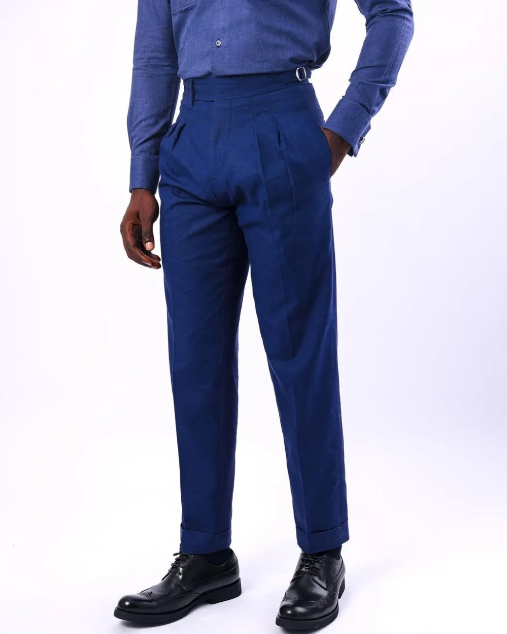 A Navy blue, Gurkha pant with double pleats trouser.