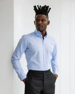 A Navy blue, herringbone high and slant collar business shirt.