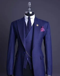 A Navy Blue, Herringbone Nobility Super “140s” “Board Room” Peak Lapel Suit