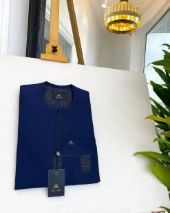 A Navy blue interconnected paisley design lines African traditional senator kaftan native.