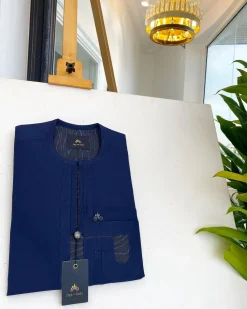 A Navy blue interconnected paisley design lines African traditional senator kaftan native.