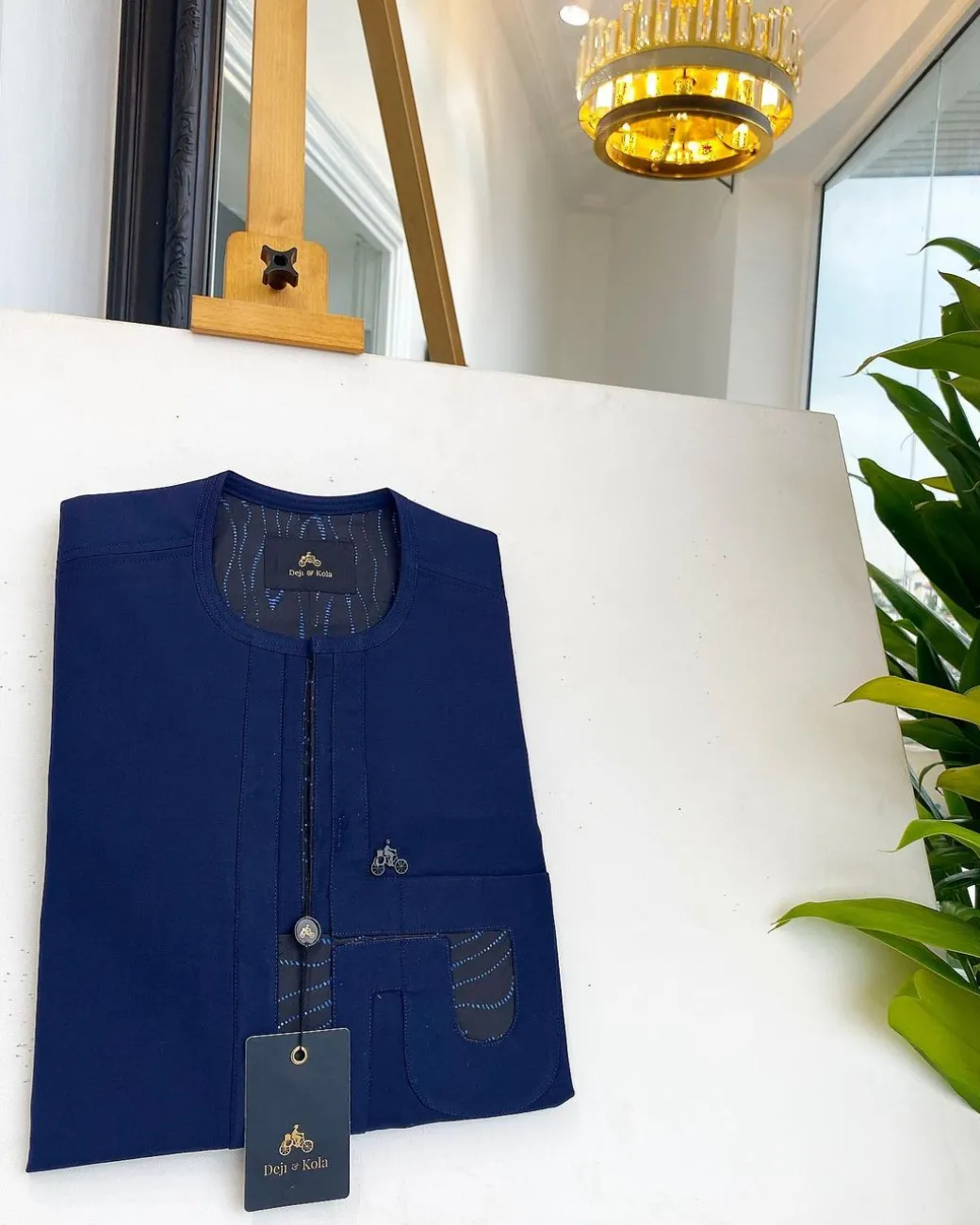 A Navy blue interconnected paisley design lines African traditional senator kaftan native.