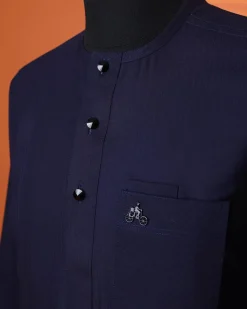 A Navy Blue, invisible pencil stripe, Jorgecarli wool, front flap, layered suit & pen pocket, 3/4 sleeve and clear view silver Swarovski button African senator kaftan native.