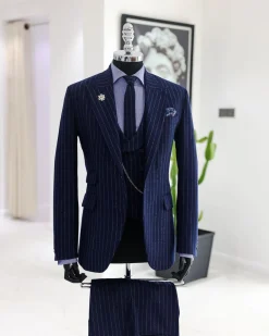 A Navy blue, ivory pencil stripe, jorgecarli, peak lapel suit